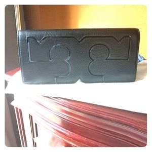 Authentic Tory Burch leather clutch